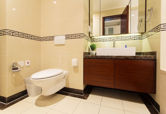 Imagen de la habitación del Hotel Qingdao Jinshan We Holiday Apt Wusi. Foto 11