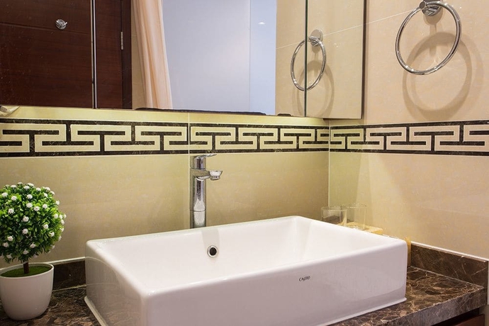 Imagen de la habitación del Hotel Qingdao Jinshan We Holiday Apt Wusi. Foto 13
