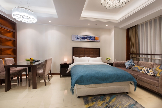 Imagen de la habitación del Hotel Qingdao Jinshan We Holiday Apt Wusi. Foto 15