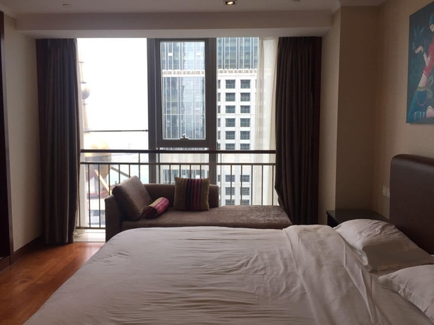 Imagen de la habitación del Hotel Qingdao Jinshan We Holiday Apt Wusi. Foto 16