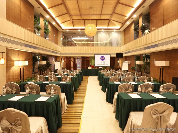 Imagen de la habitación del Hotel Qingdao Kuaitong International. Foto 9