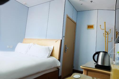 Imagen de la habitación del Hotel Qingdao Liuying Jieli - Qingdao Station Trestle Bridge Branch. Foto 12