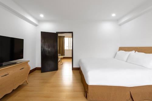 Imagen de la habitación del Hotel Qingdao Liuying Jieli - Qingdao Station Trestle Bridge Branch. Foto 17