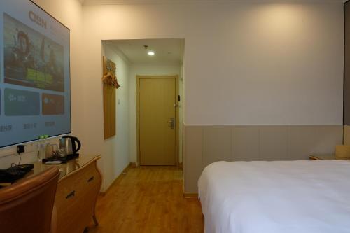 Imagen de la habitación del Hotel Qingdao Liuying Jieli - Qingdao Station Trestle Bridge Branch. Foto 20