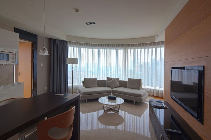 Imagen de la habitación del Hotel Qingdao Majesty Mansion. Foto 6