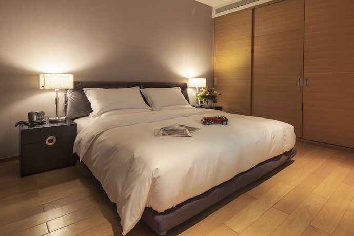 Imagen de la habitación del Hotel Qingdao Majesty Mansion. Foto 8