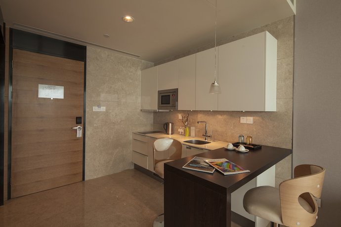 Imagen de la habitación del Hotel Qingdao Majesty Mansion. Foto 10