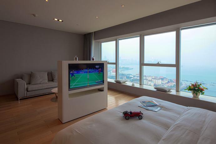 Imagen de la habitación del Hotel Qingdao Majesty Mansion. Foto 12