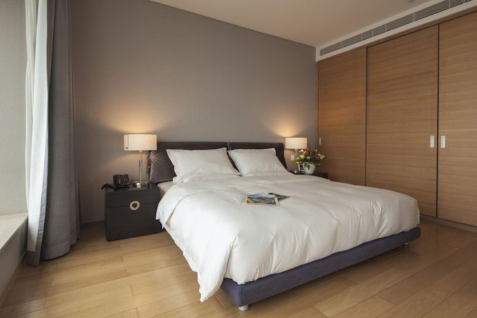 Imagen de la habitación del Hotel Qingdao Majesty Mansion. Foto 13