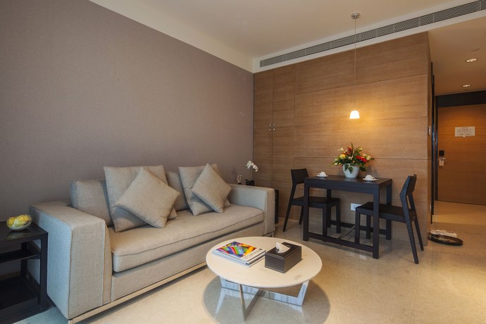 Imagen de la habitación del Hotel Qingdao Majesty Mansion. Foto 14