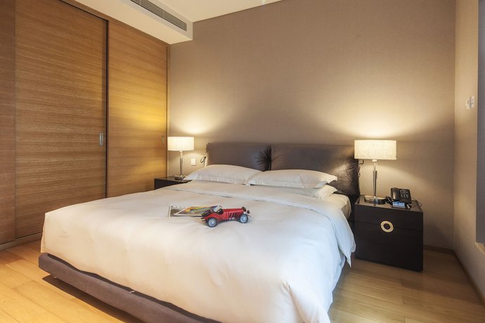 Imagen de la habitación del Hotel Qingdao Majesty Mansion. Foto 15