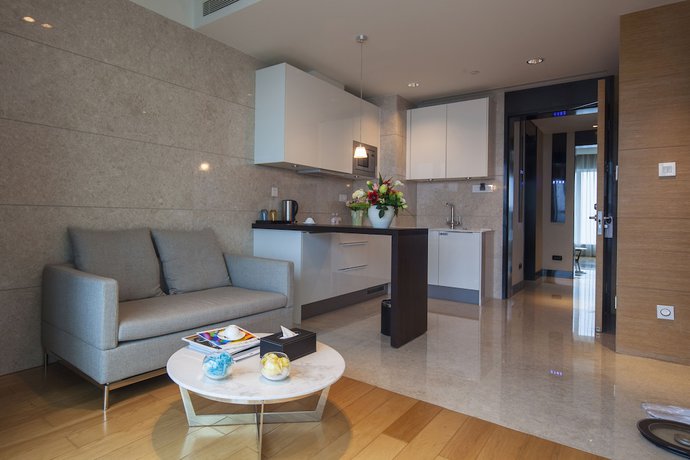Imagen de la habitación del Hotel Qingdao Majesty Mansion. Foto 17