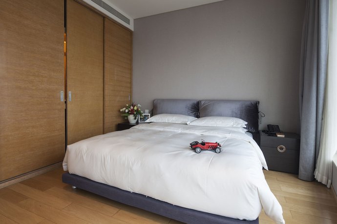 Imagen de la habitación del Hotel Qingdao Majesty Mansion. Foto 18