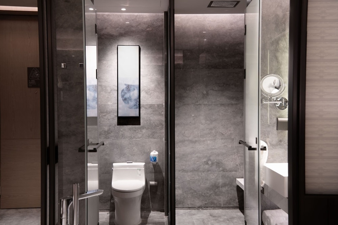 Imagen de la habitación del Hotel Qingdao Marriott Jiaozhou. Foto 4