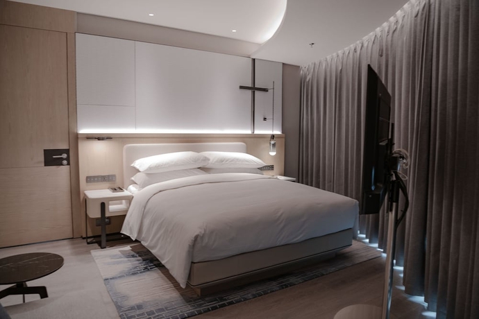 Imagen de la habitación del Hotel Qingdao Marriott Jiaozhou. Foto 5