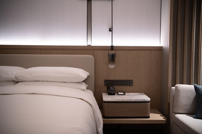 Imagen de la habitación del Hotel Qingdao Marriott Jiaozhou. Foto 8