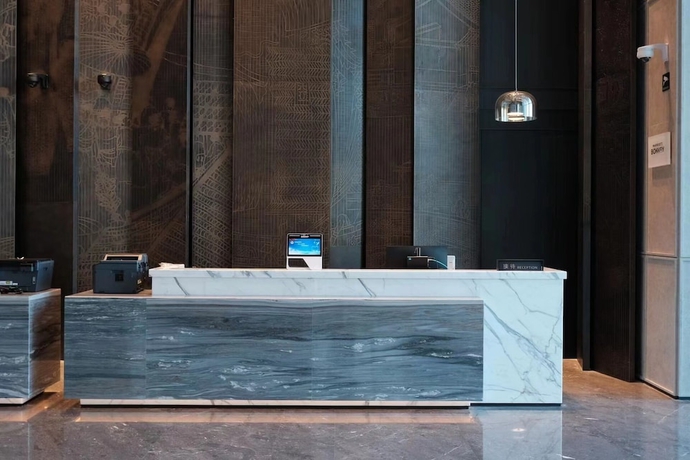 Imagen de los interiores del Hotel Qingdao Marriott Jiaozhou. Foto 16