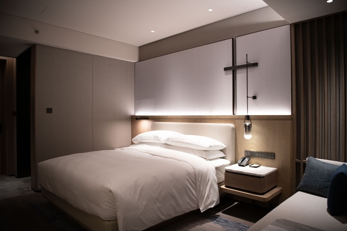 Imagen de la habitación del Hotel Qingdao Marriott Jiaozhou. Foto 14