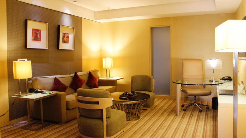 Imagen de la habitación del Hotel Qingdao Parkview Holiday. Foto 8