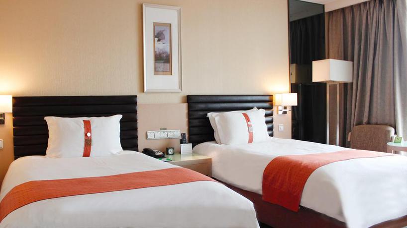 Imagen de la habitación del Hotel Qingdao Parkview Holiday. Foto 9