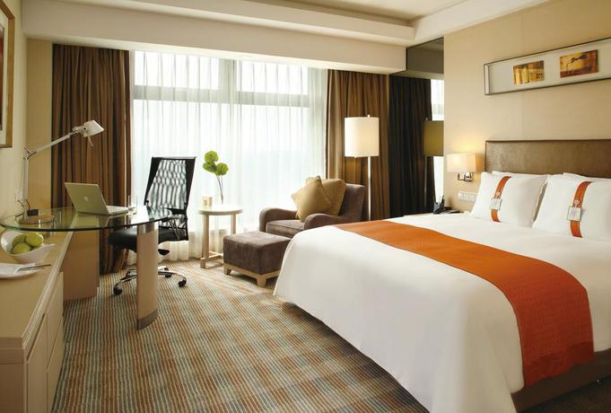 Imagen de la habitación del Hotel Qingdao Parkview Holiday. Foto 10