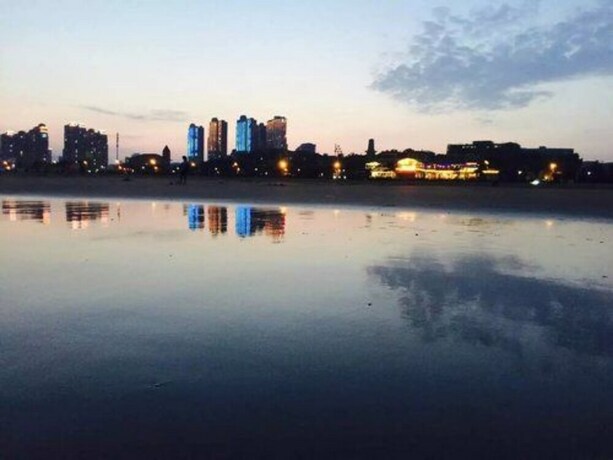 Imagen de los exteriores del Hotel Qingdao Seaside Resort Apartment. Foto 9