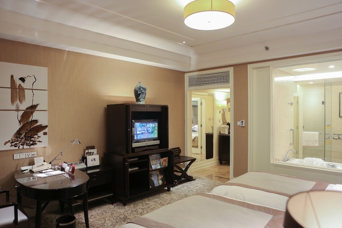 Imagen de la habitación del Hotel Qingdao Seaview Garden. Foto 5