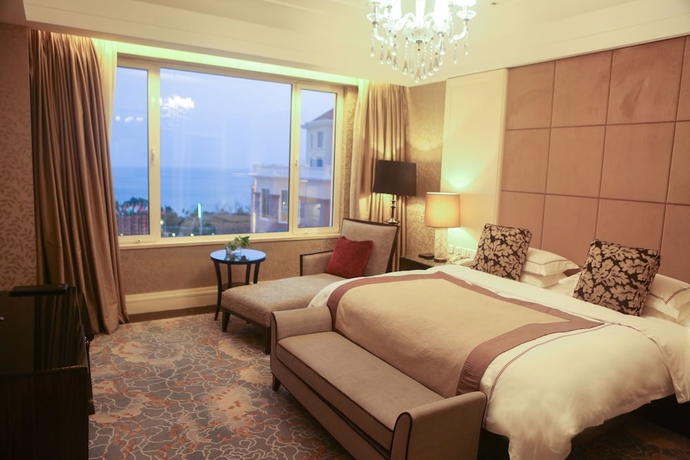 Imagen de la habitación del Hotel Qingdao Seaview Garden. Foto 6
