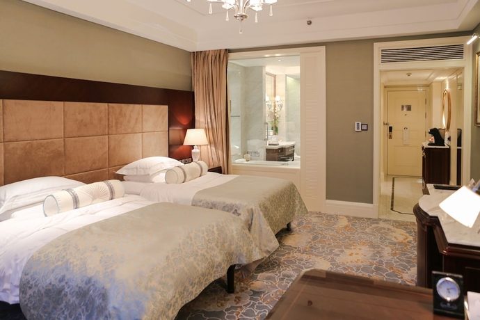 Imagen de la habitación del Hotel Qingdao Seaview Garden. Foto 10