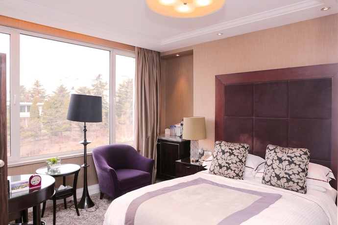 Imagen de la habitación del Hotel Qingdao Seaview Garden. Foto 12