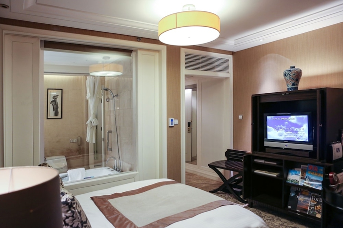 Imagen de la habitación del Hotel Qingdao Seaview Garden. Foto 13