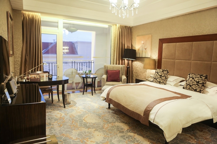 Imagen de la habitación del Hotel Qingdao Seaview Garden. Foto 15