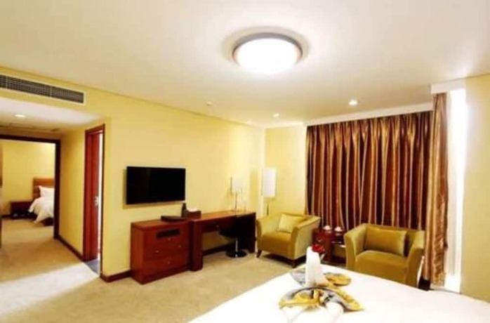 Imagen de la habitación del Hotel Qingdao Tianrunjinwang. Foto 3