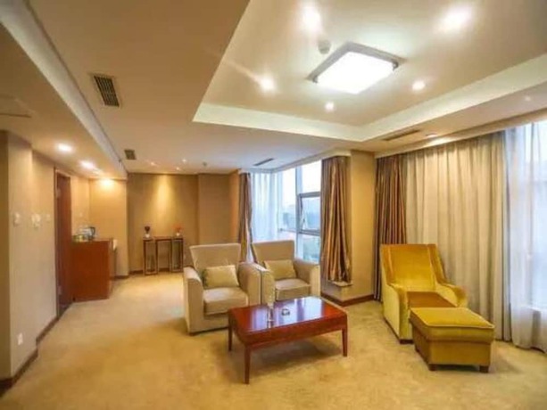 Imagen de la habitación del Hotel Qingdao Tianrunjinwang. Foto 4