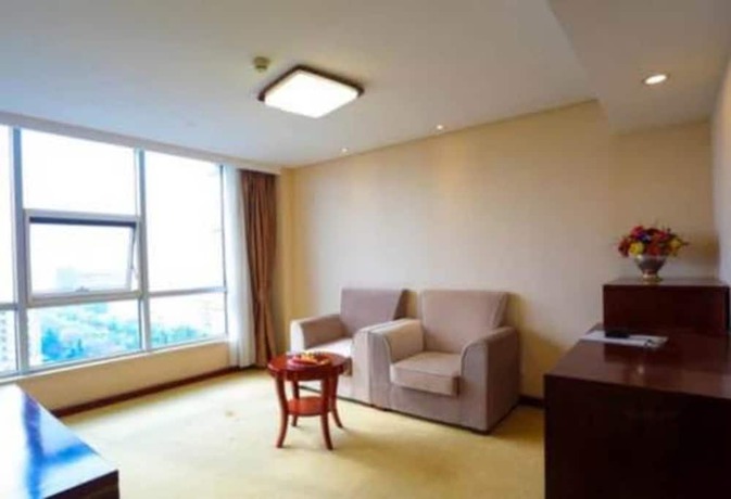 Imagen de la habitación del Hotel Qingdao Tianrunjinwang. Foto 5