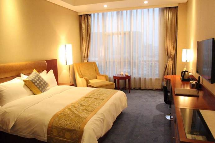 Imagen de la habitación del Hotel Qingdao Tianrunjinwang. Foto 7