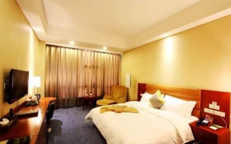 Imagen de la habitación del Hotel Qingdao Tianrunjinwang. Foto 8