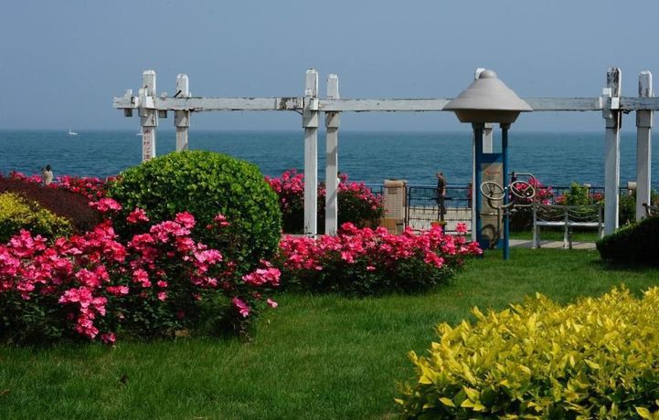 Imagen de los exteriores del Hotel Qingdao Villa Inn Seaside. Foto 12