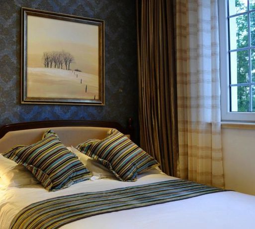 Imagen de la habitación del Hotel Qingdao Villa Inn Seaside. Foto 6