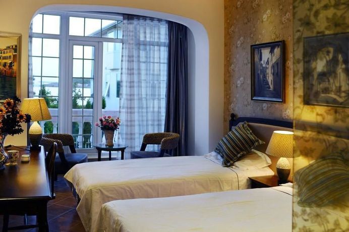 Imagen general del Hotel Qingdao Villa Inn Seaside. Foto 2