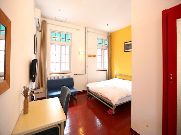 Imagen de la habitación del Hotel Qingdao Wheat Youth Hostel. Foto 11