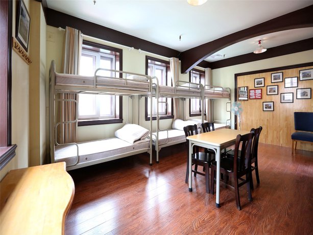 Imagen de la habitación del Hotel Qingdao Wheat Youth Hostel. Foto 13