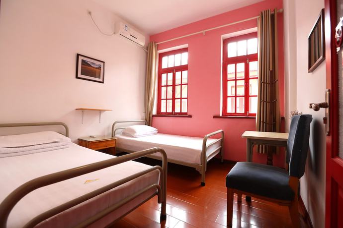 Imagen de la habitación del Hotel Qingdao Wheat Youth Hostel. Foto 17