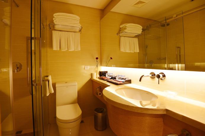Imagen de la habitación del Hotel Qingdao Wushengguan Holiday. Foto 3