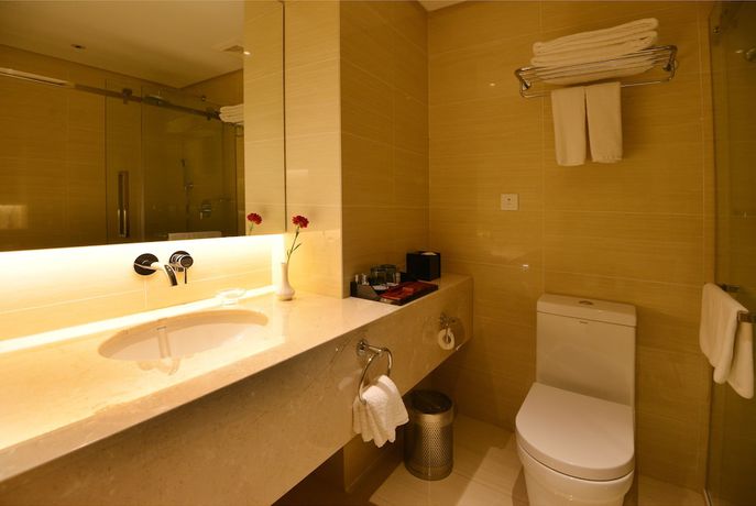 Imagen de la habitación del Hotel Qingdao Wushengguan Holiday. Foto 4