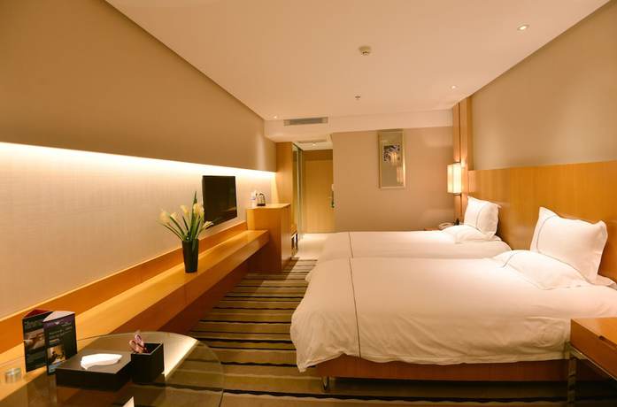 Imagen de la habitación del Hotel Qingdao Wushengguan Holiday. Foto 5