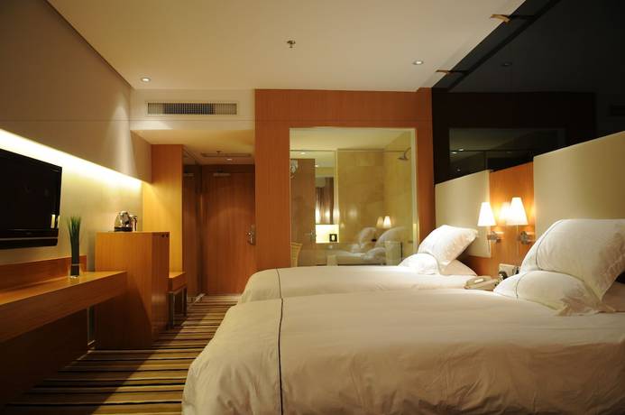 Imagen de la habitación del Hotel Qingdao Wushengguan Holiday. Foto 8