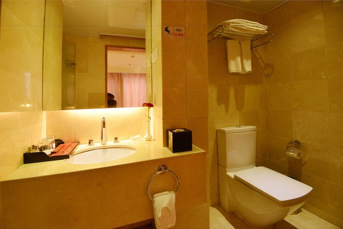 Imagen de la habitación del Hotel Qingdao Wushengguan Holiday. Foto 9