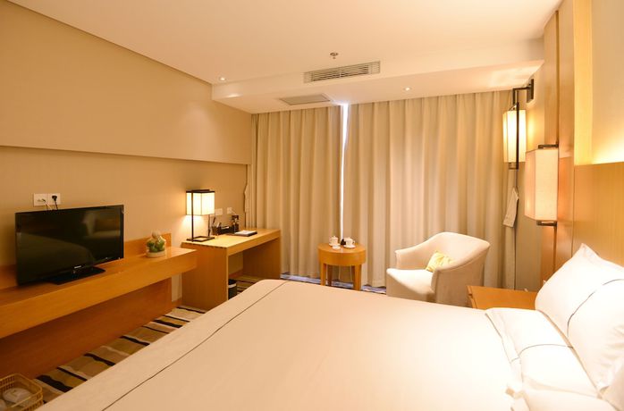 Imagen de la habitación del Hotel Qingdao Wushengguan Holiday. Foto 13