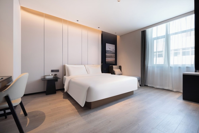 Imagen de la habitación del Hotel QingdaoWusiguangchangYaduoJiudian. Foto 3
